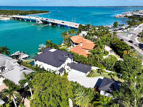aerial view of coastal homes in florida with metal roofs